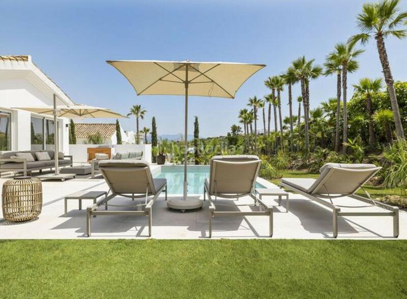 Foto 98b2e5e0-60e7-4420-8611-e1ff47f23fce. Casa amb aparcament piscina a Casares golf - Casares del sol Casares