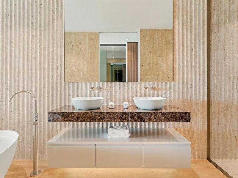 Foto c83118fb-ea05-451b-b087-610d37333c2e. Planta baja lujo en Las Lomas de Río Verde Marbella