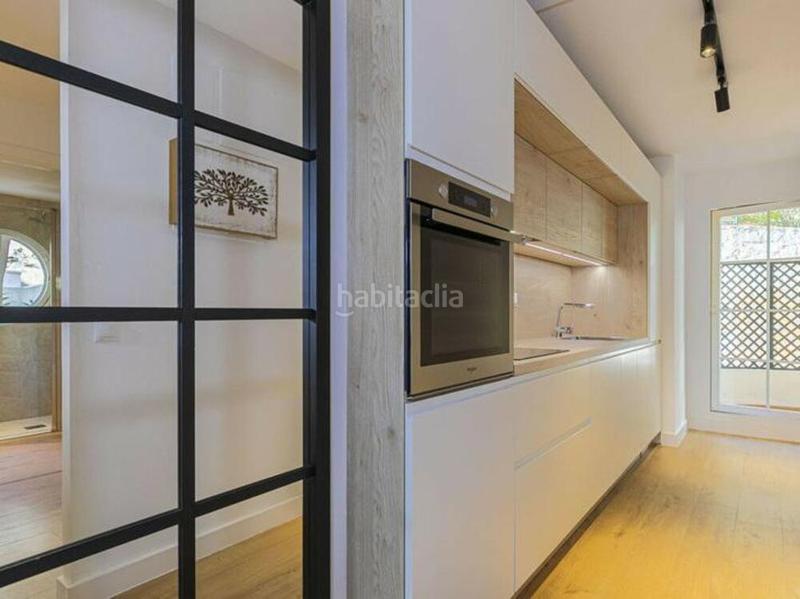 Foto 0db3e8f6-e3cf-4ca3-8846-1553fead5c0a. Rez-de-chaussée avec parking piscine dans Nueva Andalucía centro Marbella