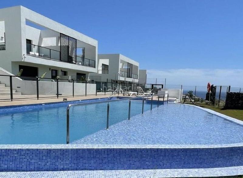 Foto 5025d218-21ec-4cc3-9af4-9acc6f4dfb43. Casa bifamiliare con parcheggio piscina in Riviera del Sol Mijas