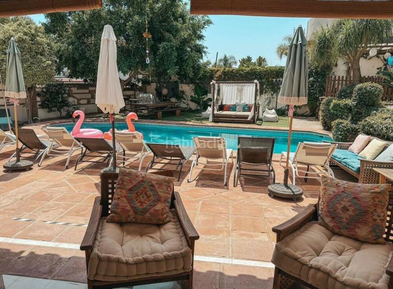 Foto b605ee4d-62da-4786-aed6-fd6ef8ca70e9. Casa con piscina in Nueva Andalucía centro Marbella