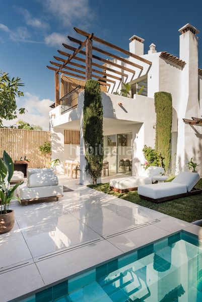 Foto 0b199ee8-b899-4bee-8c4b-208aa4e18745. Casa aparellada amb aparcament piscina a lomas de Marbella club Marbella