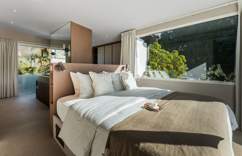 Foto 7032df15-4458-4c3e-a2b0-d48815c2e13c. Casa aparellada amb aparcament piscina a lomas de Marbella club Marbella