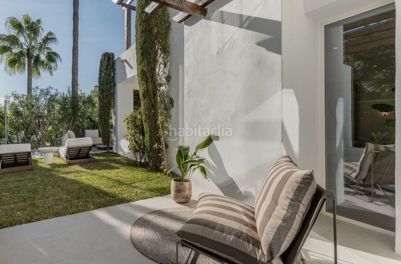 Foto be291ae8-44da-45c2-ac1e-5a71e74e8cee. Casa aparellada amb aparcament piscina a lomas de Marbella club Marbella