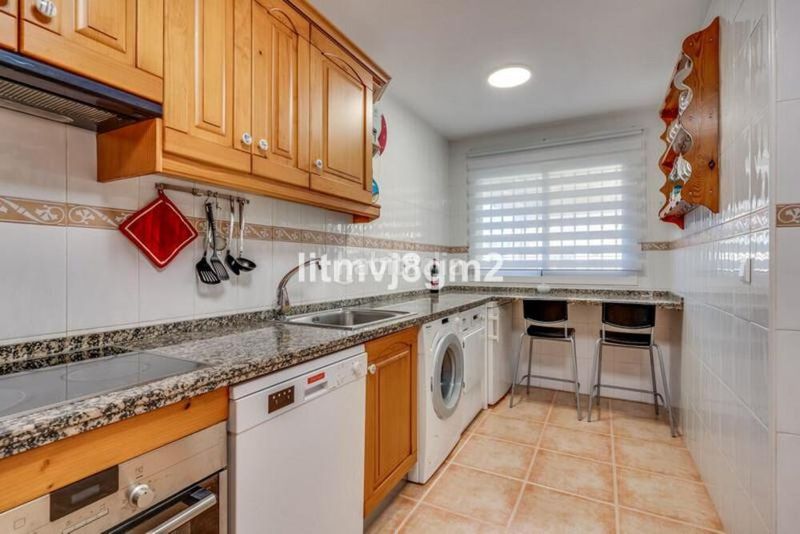 Foto e3fc5d0e-99fa-4dd3-9d8b-42e285b24587. Casa adossada amb aparcament piscina a Calahonda Mijas
