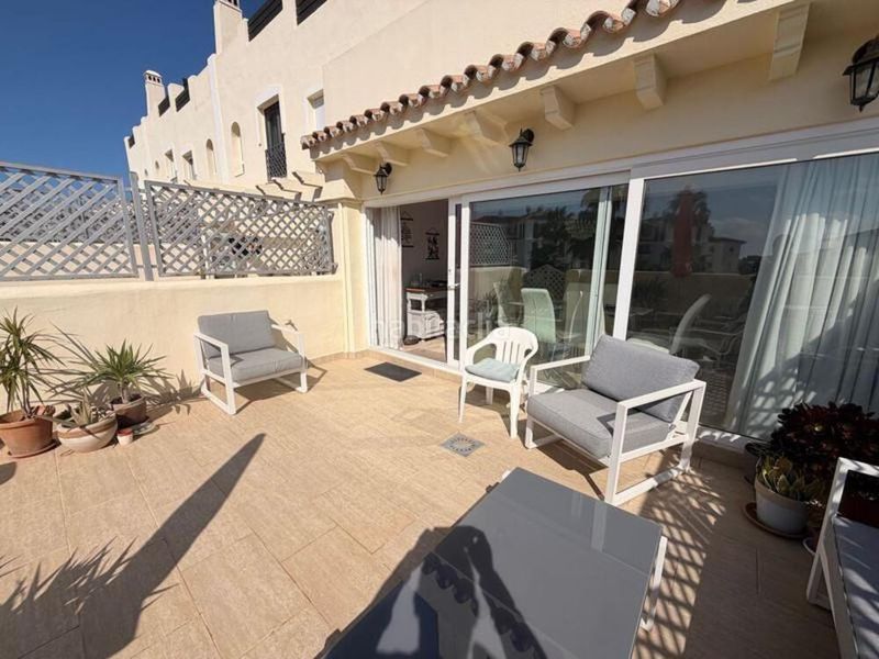 Foto c92db9c3-e06e-4d15-ba08-be46634873c4. Casa adossada amb aparcament piscina a Calahonda Mijas