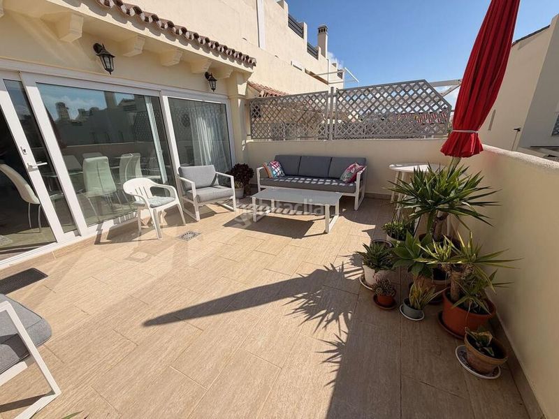 Foto df2a80f5-2d99-4eb3-9a64-173db3d2167f. Casa adossada amb aparcament piscina a Calahonda Mijas