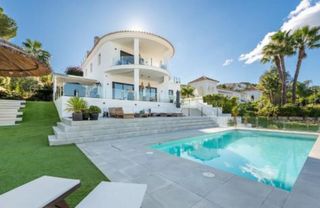 Casa a La Cala Golf - Lagar Martell. Villa de golf renovada con piscina y bar tiki en la cala golf re