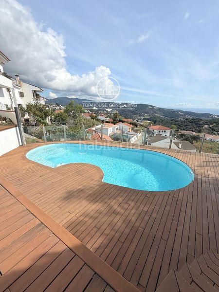 Foto 5fc24c8a-1ee3-4060-bdbd-b43fce3cf659. Casa adossada amb calefacció aparcament piscina a Sant Cebrià de Vallalta
