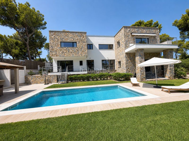 Foto 5ae69c13-c606-4e21-b39b-b0e2314b5ac9. Casa amb calefacció aparcament piscina a Cala Vinyes Calvià