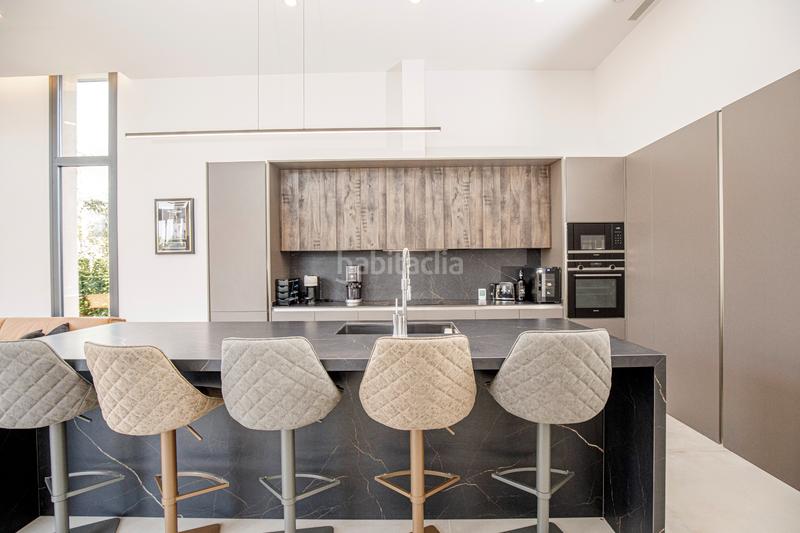 Foto 1d7deddc-b5eb-4701-94f3-9b2b5ff0c764. Casa villa única de 3 viviendas en el golf de torremirona en Navata