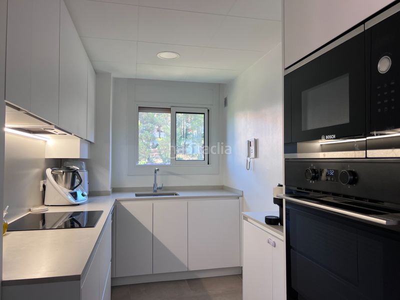 Foto db928308-6015-4713-b3e3-cb71ee1100b2. Appartamento con camino riscaldamento parcheggio in Vilassar de Dalt