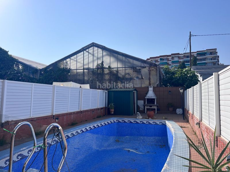 Foto 1e2ad19e-04b5-4253-9e21-3c7e7b875a2b. Casa adossada amb xemeneia calefacció aparcament piscina a Premià de Mar