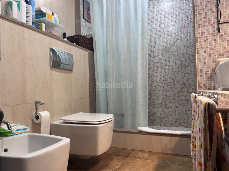 Foto 42d2880c-c38b-4273-a28b-cd00c15286c5. Casa adossada amb xemeneia calefacció aparcament piscina a Premià de Mar