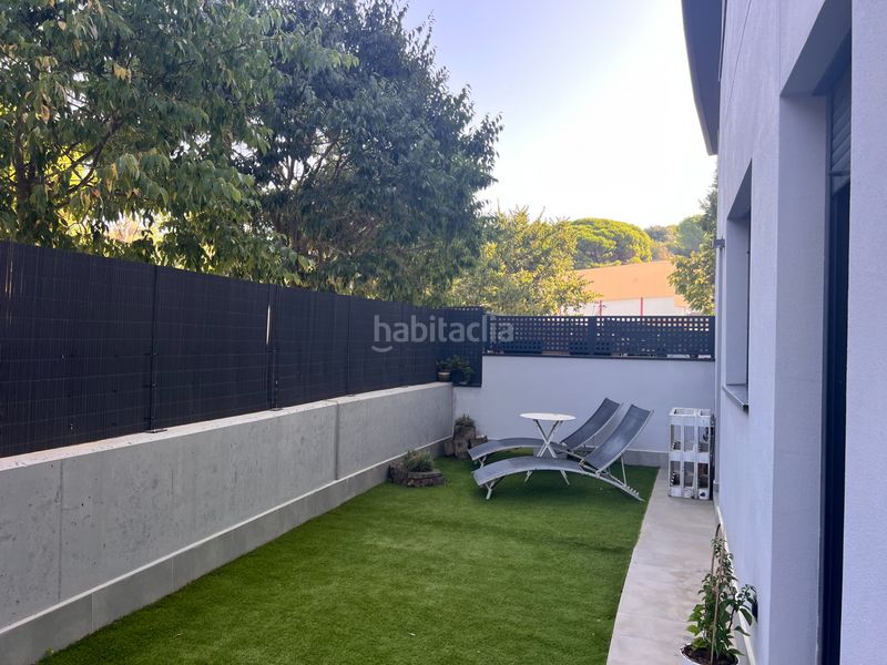 Foto 4a31ec89-8f63-41d2-b38a-cc4d8bfe6e5e. Planta baixa amb xemeneia calefacció aparcament piscina a Arenys de Mar