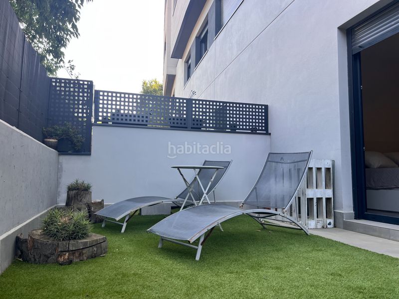 Foto b22d0380-9aed-4d1e-b8c9-9a8335a3819e. Planta baixa amb xemeneia calefacció aparcament piscina a Arenys de Mar