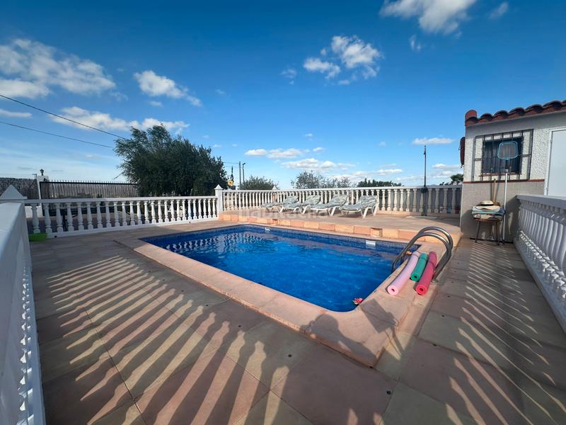 Foto d3afe60f-1f3d-47b7-ab40-3b2a76279d6e. Mas avec cheminée chauffage parking piscine dans Fortuna