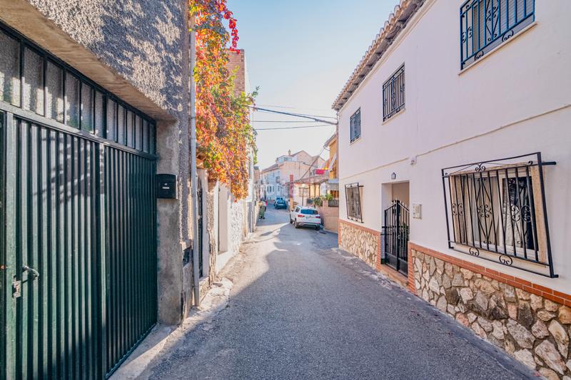 Foto 218bdb86-7d53-4756-af10-6ca9d5a4e046. Casa amb xemeneia a Barrio de la Vega Monachil
