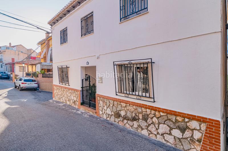 Foto 2ba0acef-b3a0-4465-a8b0-95fa11b9e543. Casa amb xemeneia a Barrio de la Vega Monachil