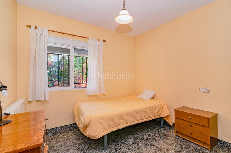 Foto 7ba29f00-2f31-4706-b1dc-9fd52dc7a64a. Casa amb xemeneia a Barrio de la Vega Monachil