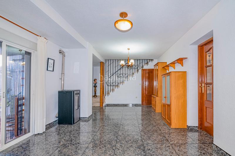 Foto db4e568d-a722-407c-a112-e71c06f3b24b. Casa amb xemeneia a Barrio de la Vega Monachil