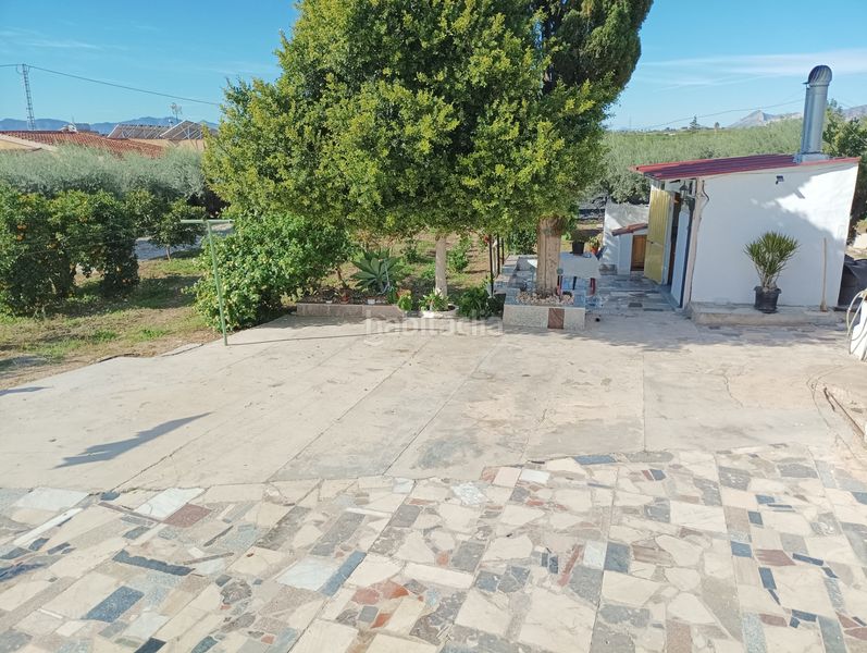 Foto 93b2d6e8-18cb-449f-bd98-a74827069ec4. Masia amb xemeneia calefacció aparcament piscina a Albatera