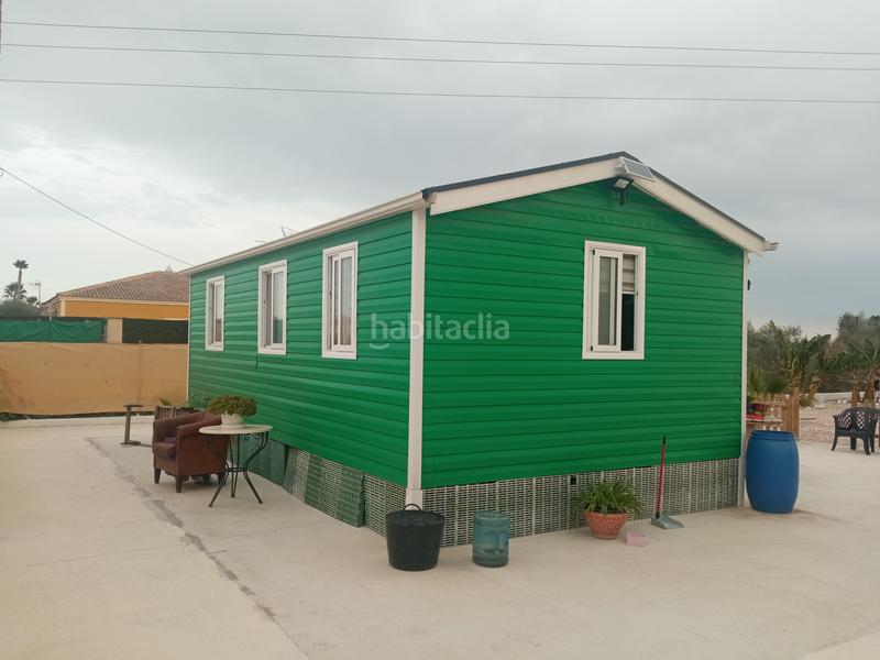 Foto bc4f9a66-60fa-4d3f-bcc1-1eed2bdf57c8. Masia amb aparcament a Catral