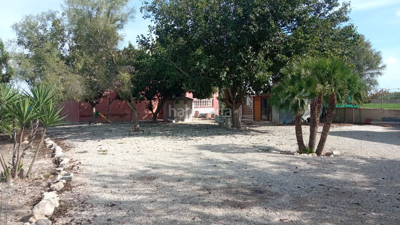 Foto 57419f57-e58e-4e0a-a0c6-0b54f27fc390. Xalet amb xemeneia calefacció aparcament a Catral