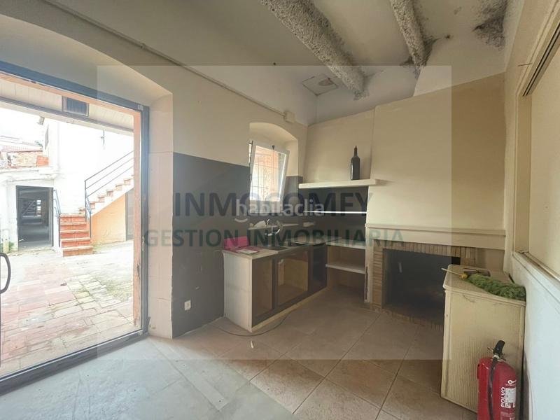Foto f61ad456-fdaf-49fc-a8a1-56b0158dd965. Casa in calle aigueta in Bisbal d´Empordà (La)