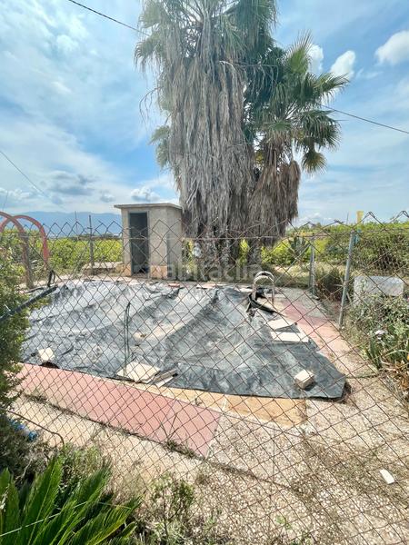 Foto a264261a-ebb2-4b15-882e-a4d85b77e323. Masía ¡dos terrenos en venta con casa, cochera, piscina! en Librilla