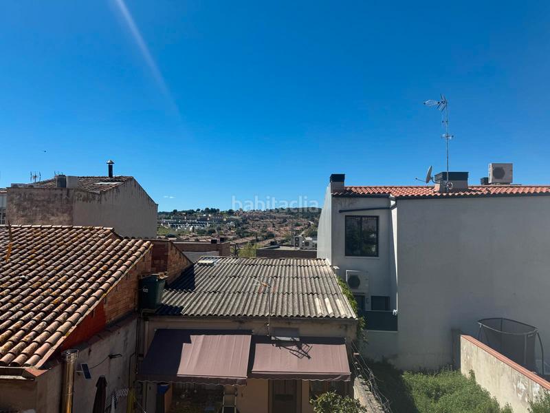 Foto f13b567d-8a22-4244-bc7d-4bdb2cf2ccf7. Piano terra con camino riscaldamento in Centre Sant Quirze del Vallès