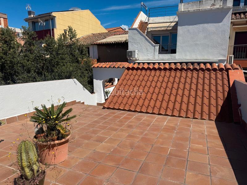 Foto 5d84b8af-9a79-4f4e-91fe-7876216ad6a3. Planta baixa amb xemeneia calefacció a Centre Sant Quirze del Vallès