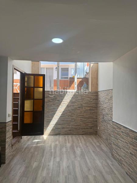 Foto 33c2467e-c265-490d-b397-4596f270c734. Rez-de-chaussée avec cheminée chauffage dans Centre Sant Quirze del Vallès