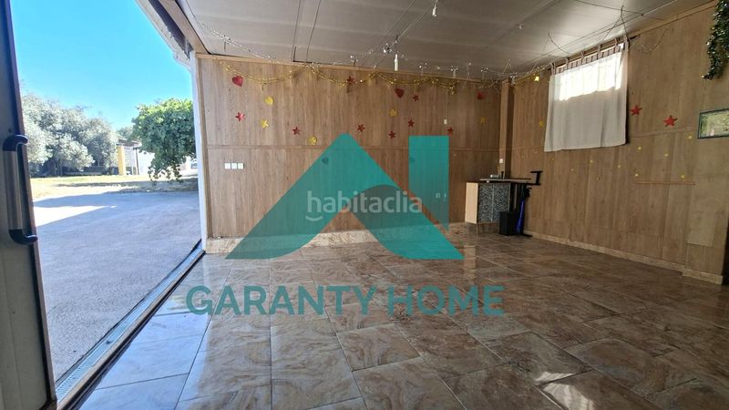 Foto 7db39f93-10d0-4f5b-8f7d-f994d0b33f19. Xalet amb calefacció aparcament piscina a Malpartida de Cáceres