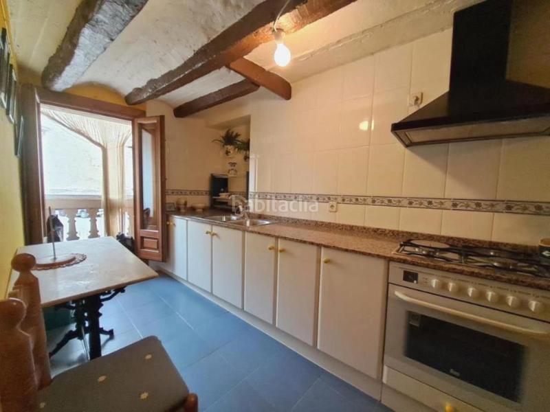 Foto 73038ba8-adb3-46f7-a252-a709b59c99d1. Casa aparellada amb xemeneia a Peñarroya de Tastavins