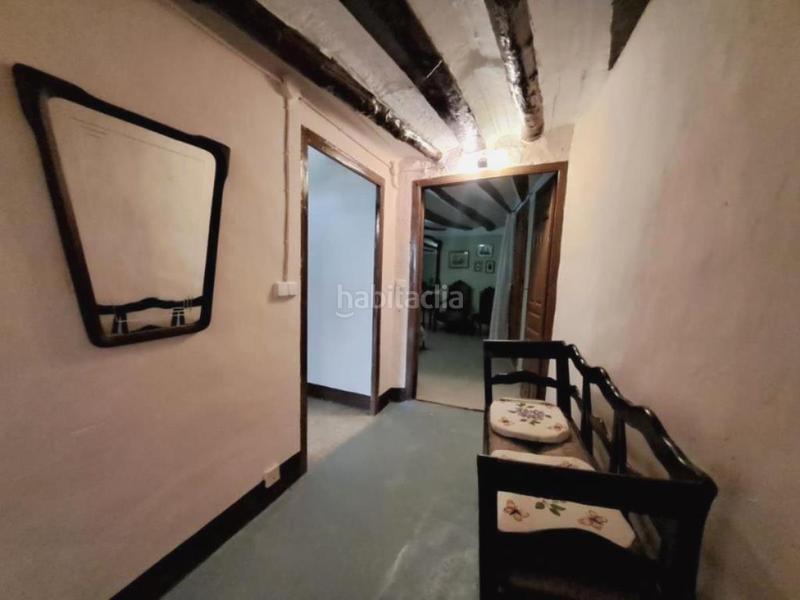 Foto 78e7b4e4-0c6a-45b3-9b8b-544328e7db69. Casa aparellada amb xemeneia a Peñarroya de Tastavins