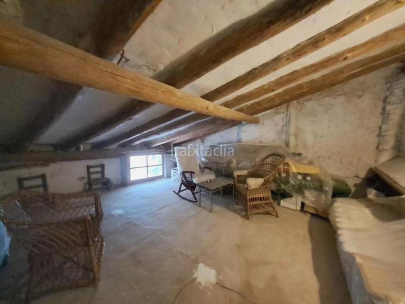 Foto f7d95d93-5ed6-48b5-a3fd-8f2649653f17. Casa aparellada amb xemeneia a Peñarroya de Tastavins