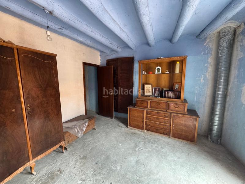 Foto f623a49d-d8a4-456c-bc68-c472fd463ab4. Casa bifamiliare con parcheggio in Ráfales