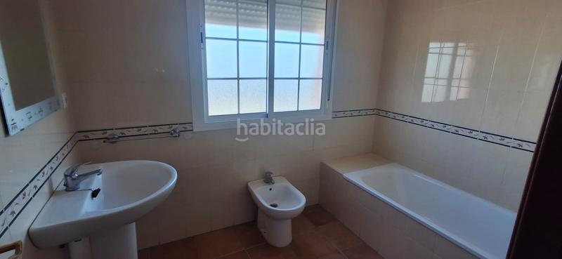 Foto 142b6a31-6978-45fc-9464-05c7ac736585. Casa adossada amb aparcament piscina a Arco Norte - Avda España Dos Hermanas