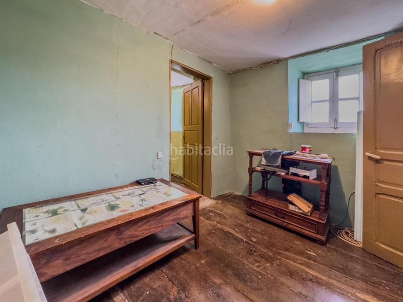 Foto 154ac7ec-1f1d-40dc-a332-a30390efd8b9. Casa adossada a Polaciones