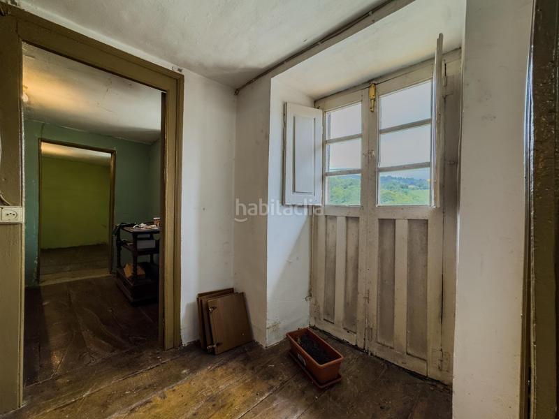 Foto 81e7b4ba-2f81-405d-939a-e64160bd36e5. Casa adossada a Polaciones