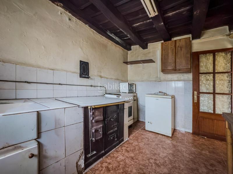 Foto fbf7a84e-7e45-4638-8da7-672335fa252e. Casa adossada a Polaciones