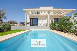 Casa bifamiliare in Porto Cristo. Casas adosadas de nueva construcción con un diseño moderno