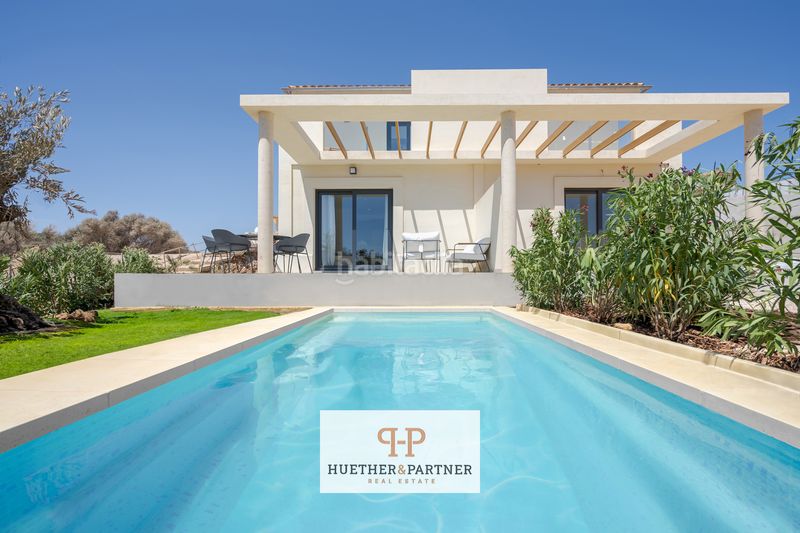 Foto ee5c9386-dfb0-4016-8bf8-31658ab56ba2. Casa pareada casas adosadas de nueva construcción con un diseño moderno en Manacor