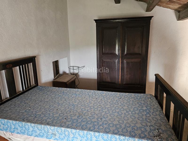 Foto c819cc2a-dd18-415d-b9e2-d9db05cab224. Finca rústica terreno agrícola con una pequeña casa en Roquetes