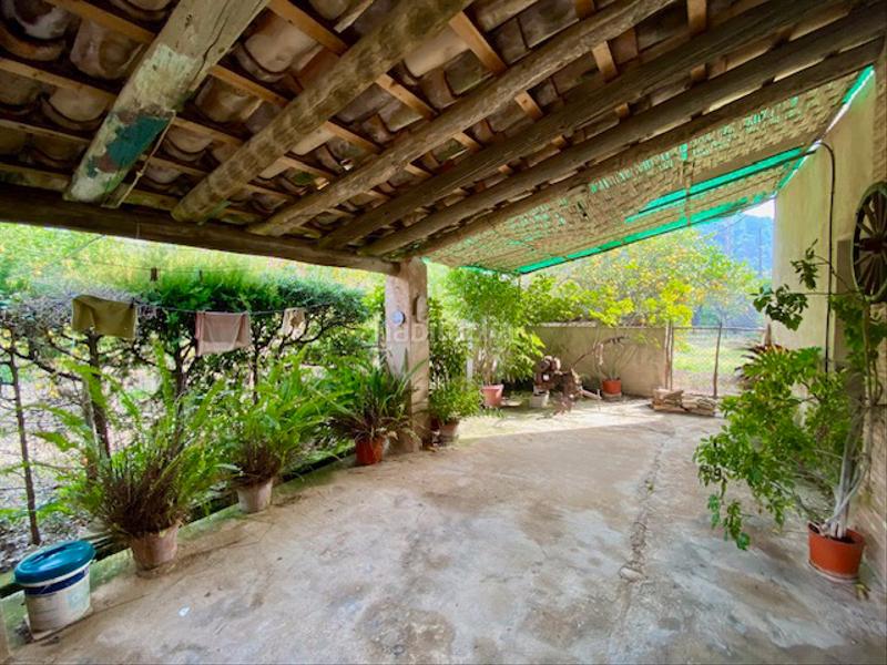 Foto 3aca271b-7e76-474f-b71a-0be0ef97f49e. Casa amb xemeneia aparcament piscina a Sóller