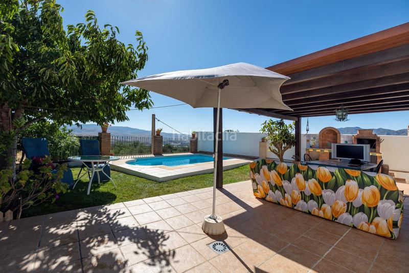 Foto 7a82c368-eb99-4ad9-b21b-f2e5c847aca7. Chalet in calle nazcoz 8 in Nigüelas