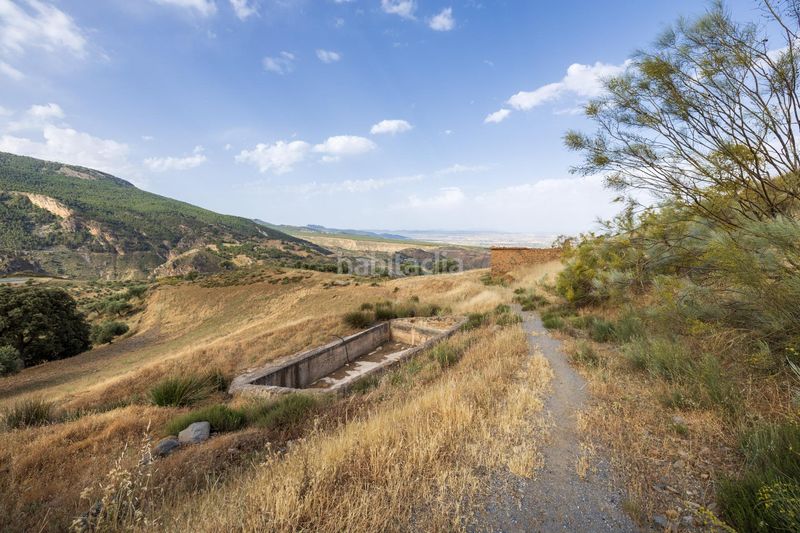 Foto bd3690c3-80fc-4d91-889a-93fe365c6603. Finca rústica a calle emilio aragon 12 a Monachil pueblo Monachil