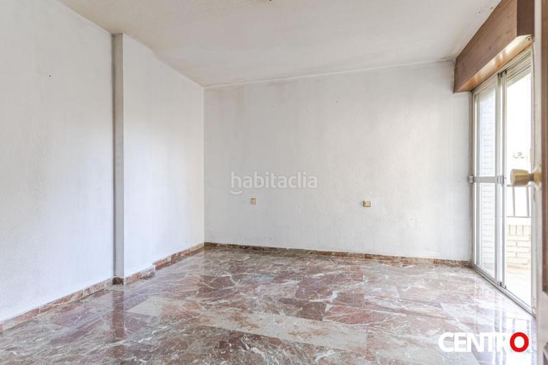 Foto 1f80fcd0-57d9-4ee3-b9a4-6a55d4549ae8. Piso  don garaje y terrazas en Plaza de Toros Granada