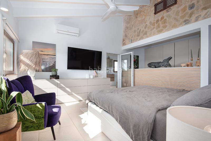 Foto 129cd4c4-9968-4aea-a04f-c91fce94ee3c. Casale con camino riscaldamento parcheggio piscina in Llucmajor